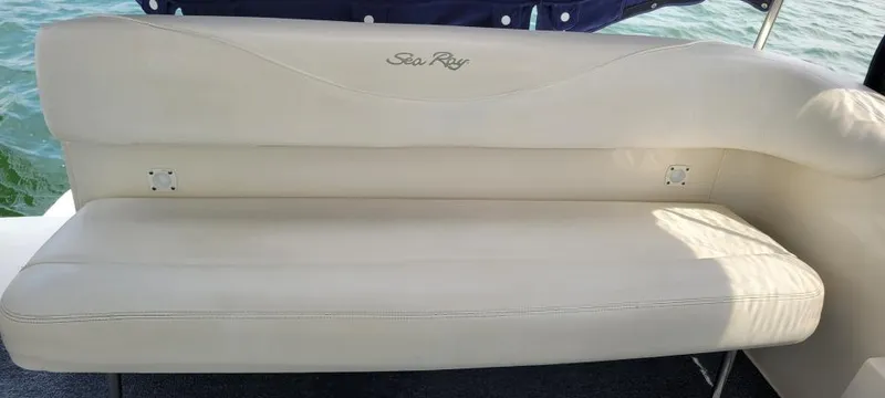 Slide: The Image of Cream leather seating on a 2004 Sea Ray Sundancer 260 boat. - 34