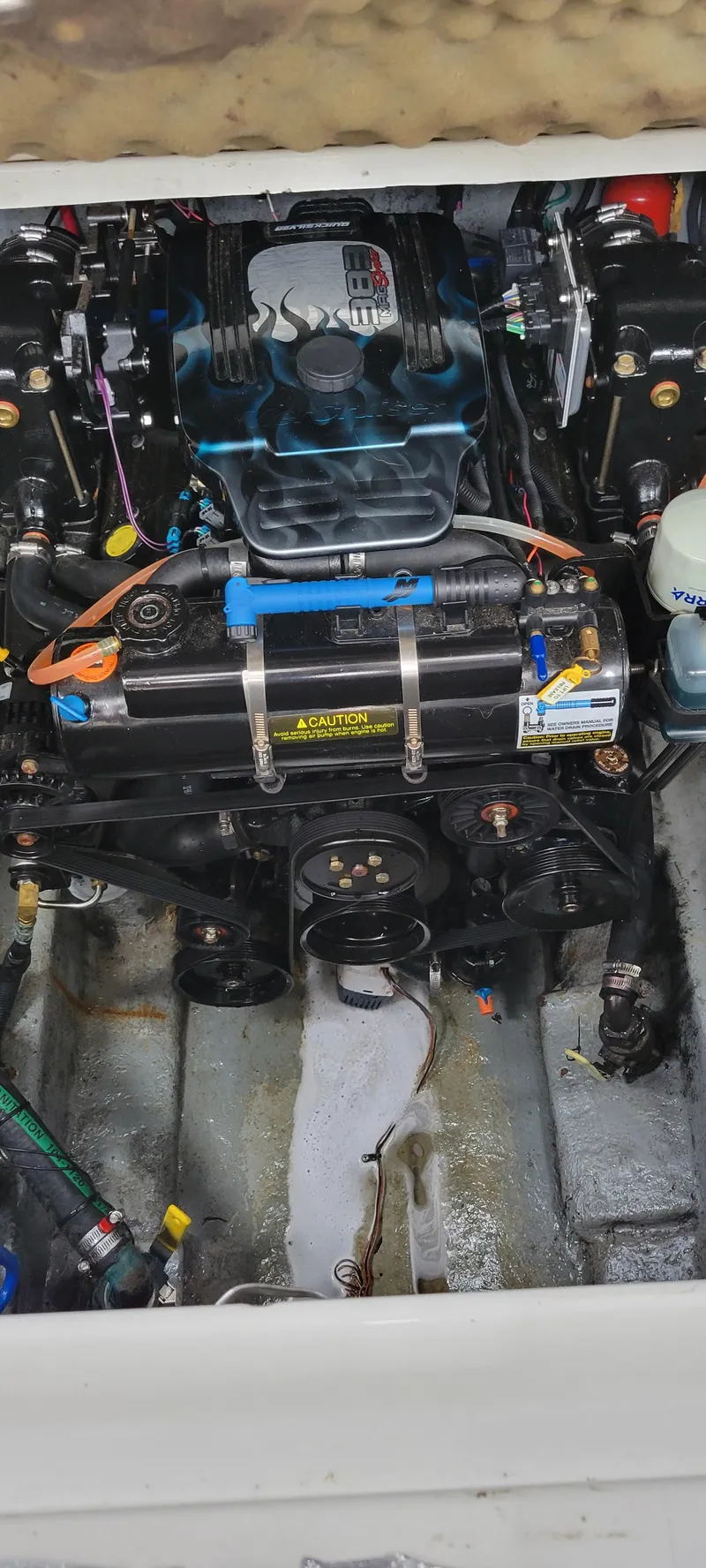 Slide: The Image of Engine compartment of a 2004 Sea Ray Sundancer 260 boat. - 49