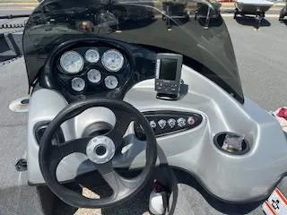 Slide: The Image of 2015 Tracker Pro Guide V-175 SC boat dashboard with gauges and navigation system. - 17