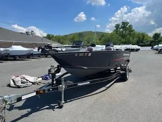 Slide: The Image of 2015 Tracker Pro Guide V-175 SC boat on trailer in parking lot. - 3