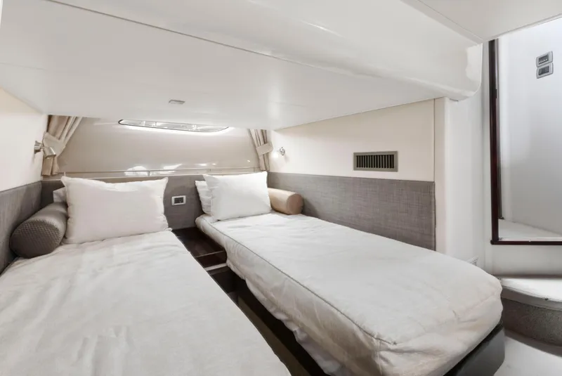 Slide: The Image of Luxurious cabin interior of 2017 Sea Ray Fly 400 yacht with twin beds. - 28