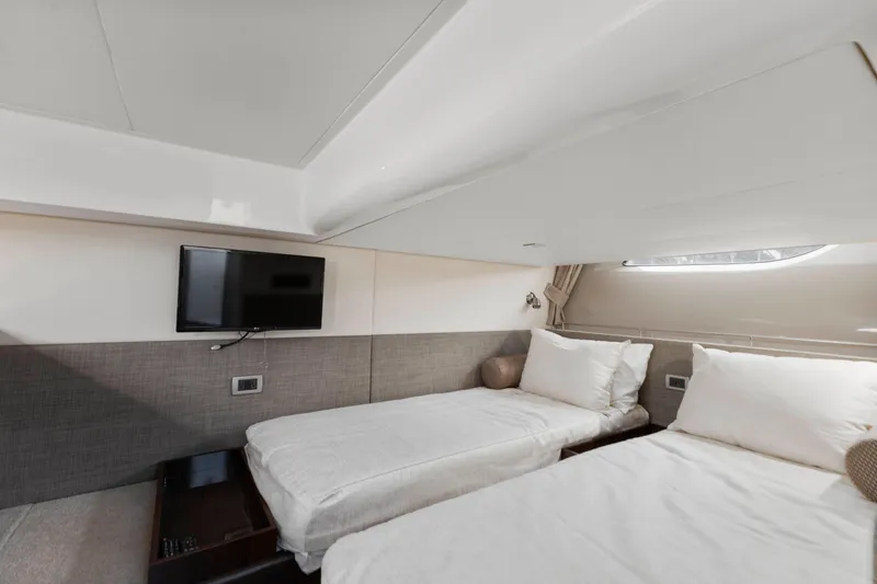 Slide: The Image of Interior cabin of 2017 Sea Ray Fly 400 yacht with twin beds and TV. - 29