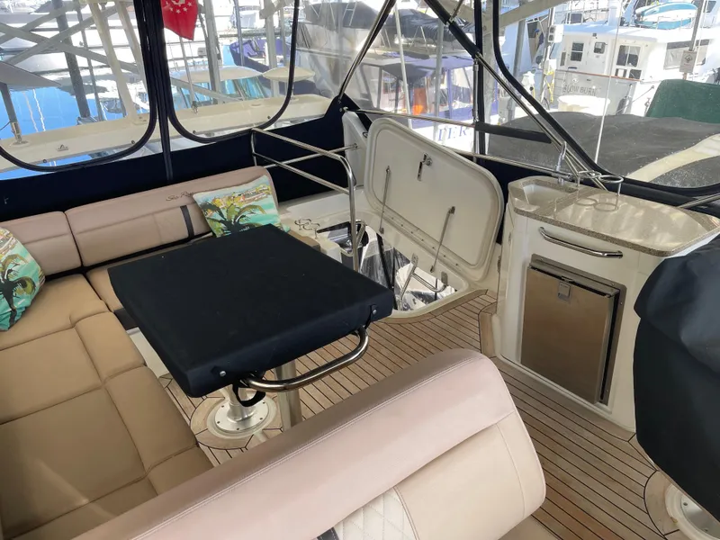 Slide: The Image of Luxurious 2017 Sea Ray Fly 400 yacht interior with seating and table. - 48
