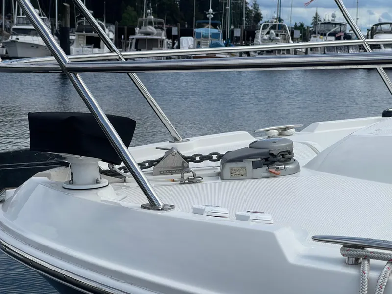 Slide: The Image of 2017 Sea Ray Fly 400 yacht bow with anchor system, docked in marina. - 54