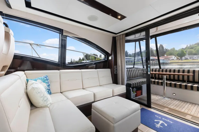 Slide: The Image of Luxurious interior of 2017 Sea Ray Fly 400 yacht with plush seating and scenic views. - 8