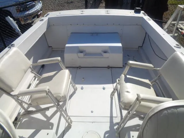 Slide: The Image of 1980 Grady-White 241 WEEKENDER boat interior with seating and storage. - 9