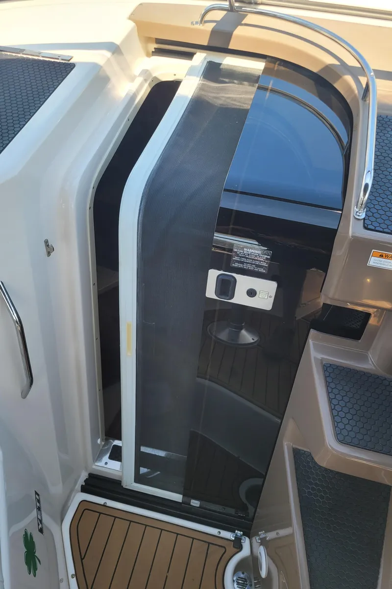 Slide: The Image of 2006 Regal 3060 Window Express boat cabin entrance with sliding door. - 35