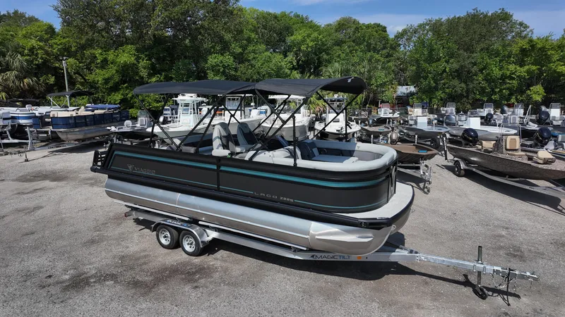 Slide: The Image of 2025 Viaggio Z22S pontoon boat on trailer in outdoor lot. - 10