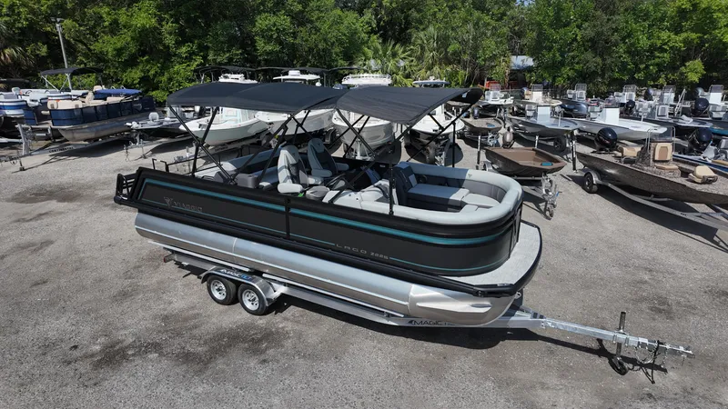 Slide: The Image of 2025 Viaggio Z22S pontoon boat on trailer, featuring sleek design and spacious seating. - 11