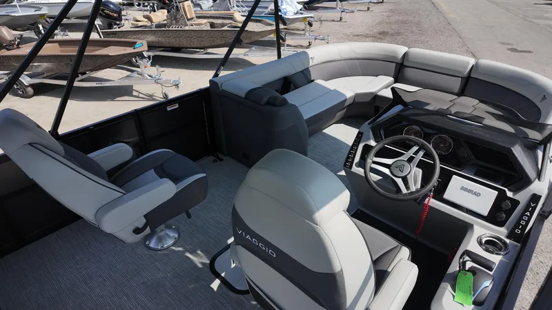 Slide: The Image of 2025 Viaggio Z22S boat interior with modern seating and steering wheel. - 33