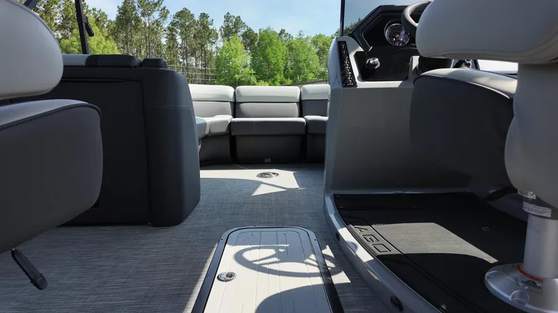 Slide: The Image of Interior of 2025 Viaggio Z22S boat with modern seating and steering area. - 37