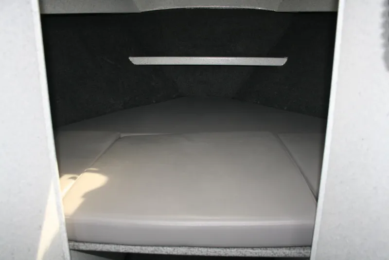 Slide: The Image of 2017 North River 2500 S Sew Hawk OS cabin interior with cushioned seating. - 22