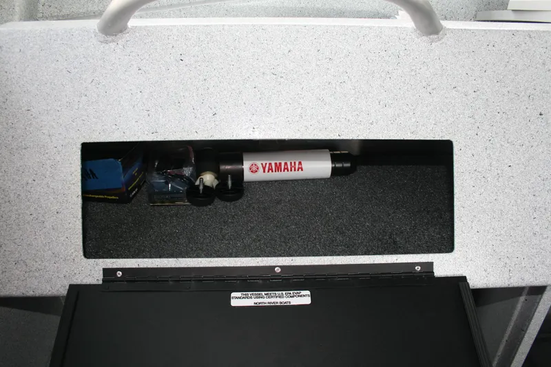 Slide: The Image of Storage compartment in a 2017 North River 2500 S Sew Hawk OS boat with Yamaha equipment. - 33