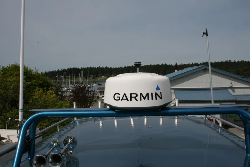 Slide: The Image of Garmin radar on 2017 North River 2500 S Sew Hawk OS boat, docked near marina. - 39