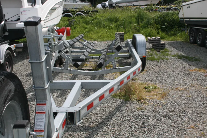 Slide: The Image of Boat trailer for 2017 North River 2500 S Sew Hawk OS on gravel lot. - 44