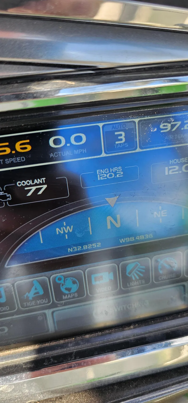 Slide: The Image of Close-up of 2017 Tigé Z3 boat dashboard display showing speed, coolant, and navigation details. - 23