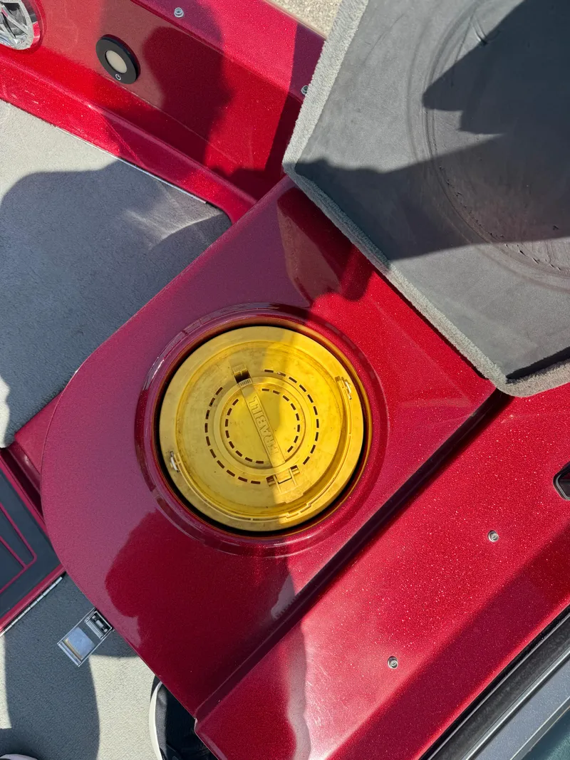 Slide: The Image of 2016 Yar-Craft 209TFX boat with a yellow hatch on a red deck. - 21