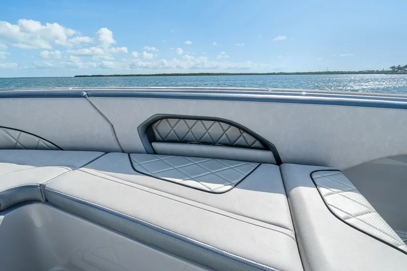 Slide: The Image of Luxury seating on 2025 Deep Impact 369 Sport boat with ocean view. - 12