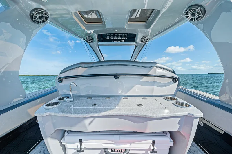 Slide: The Image of Interior view of 2025 Deep Impact 369 Sport boat with ocean backdrop. - 37