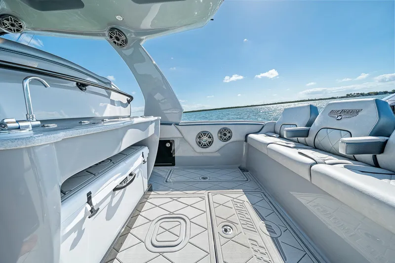Slide: The Image of Luxurious interior of 2025 Deep Impact 369 Sport boat with seating and ocean view. - 39
