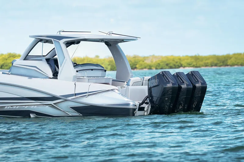 Slide: The Image of 2025 Deep Impact 369 Sport boat with triple engines on water. - 6