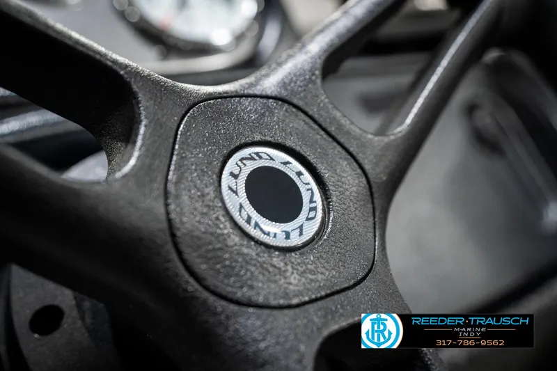 Slide: The Image of Steering wheel of 2021 Lund 1650 ANG SS boat, close-up view. - 27
