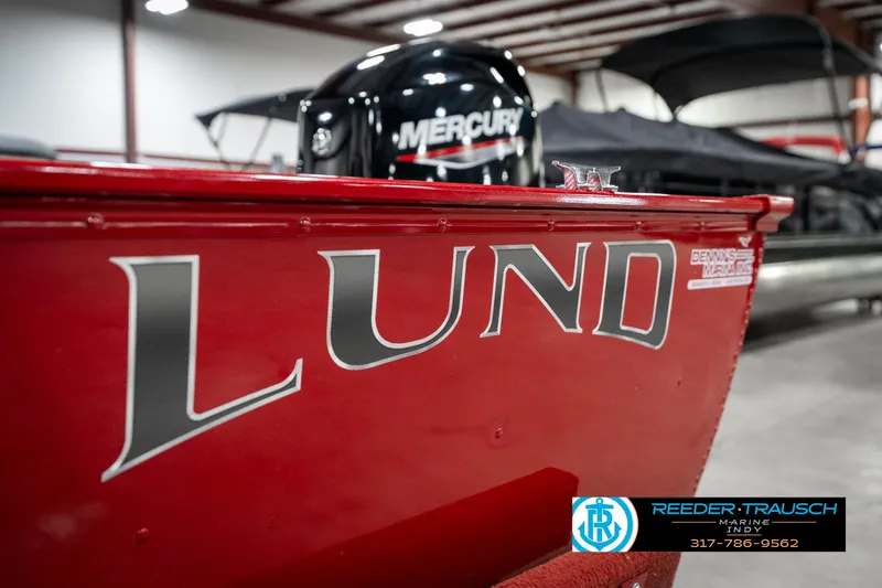 Slide: The Image of 2021 Lund 1650 ANG SS boat with Mercury engine in showroom. - 43