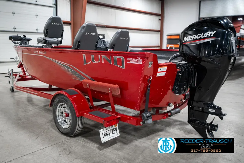 Slide: The Image of Red 2021 Lund 1650 ANG SS boat with Mercury engine in a showroom. - 8