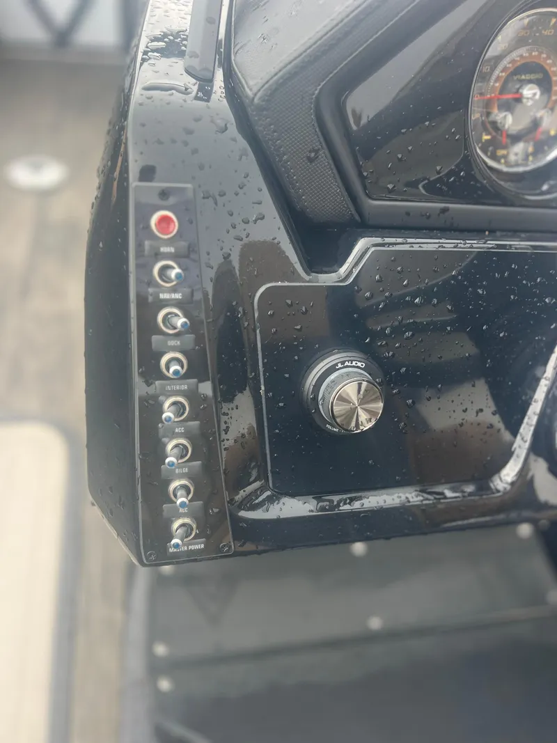 Slide: The Image of Close-up of 2024 Viaggio Z24S boat dashboard with controls and gauges. - 11