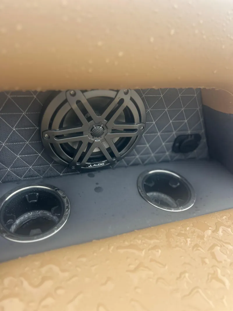 Slide: The Image of Speaker and cup holders in 2024 Viaggio Z24S boat interior. - 15