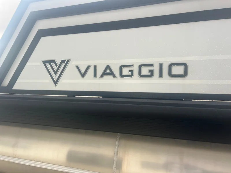 Slide: The Image of Viaggio Z24S 2024 logo on sleek metallic surface. - 6