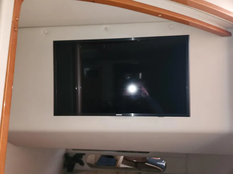 Slide: The Image of Flat-screen TV inside 2005 Chaparral Signature 350 boat cabin. - 8