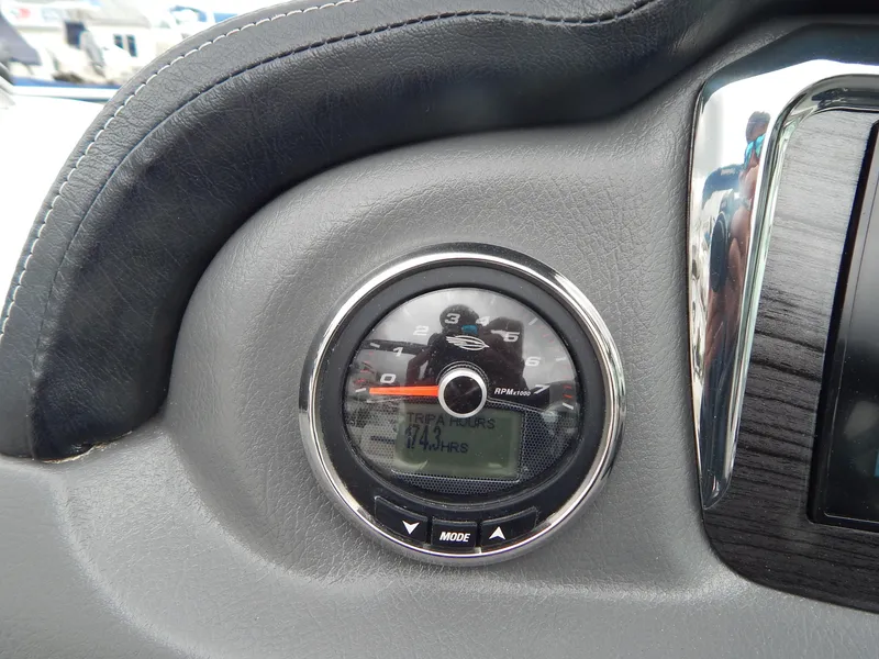 Slide: The Image of Dashboard gauge of 2016 Chaparral 246 SSi boat, displaying 114 hours. - 32