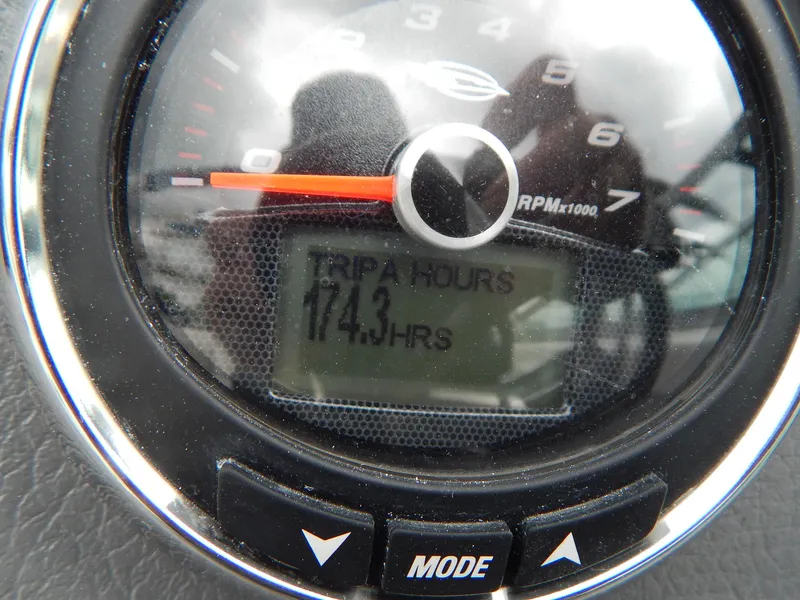 Slide: The Image of Close-up of Chaparral 246 SSi 2016 boat gauge showing 174.3 trip hours. - 33