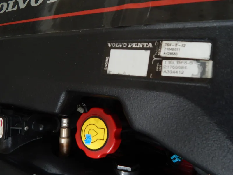 Slide: The Image of Close-up of a Volvo Penta engine in a 2016 Chaparral 246 SSi boat. - 39