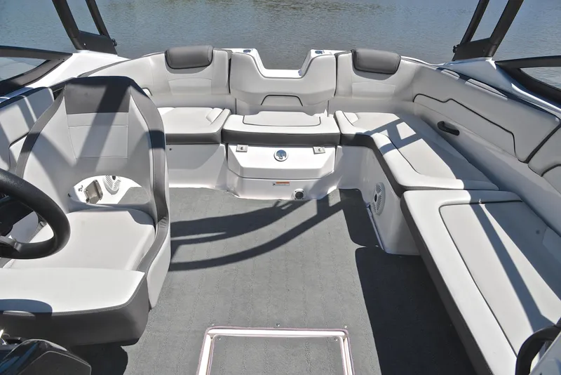 Slide: The Image of 2023 Yamaha Boats AR190 interior with spacious seating and modern design. - 22