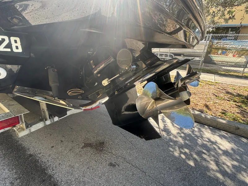 Slide: The Image of 2014 Monterey 328 Super Sport boat propeller and stern detail in sunlight. - 6