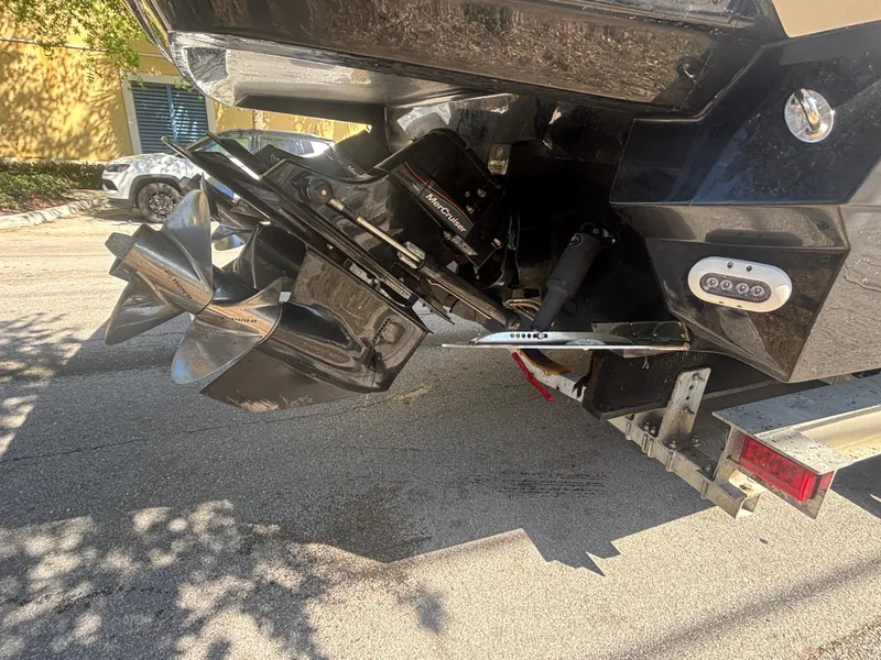 Slide: The Image of 2014 Monterey 328 Super Sport boat propellers and stern on a trailer. - 7