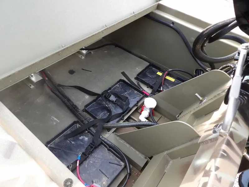 Slide: The Image of Interior view of 2025 Crestliner 2070 Retriever SCHD boat showing battery compartment. - 39