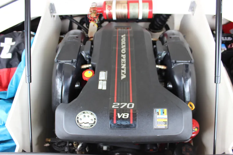 Slide: The Image of Volvo Penta 270 V8 engine in a 2012 Regal 2100 RS Bowrider boat. - 17