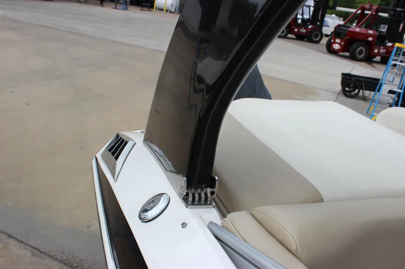 Slide: The Image of 2012 Regal 2100 RS Bowrider boat interior with seating and sleek design. - 27