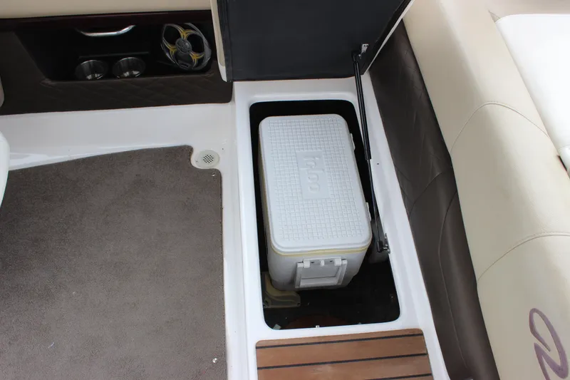 Slide: The Image of 2012 Regal 2100 RS Bowrider with built-in storage compartment and cooler. - 33