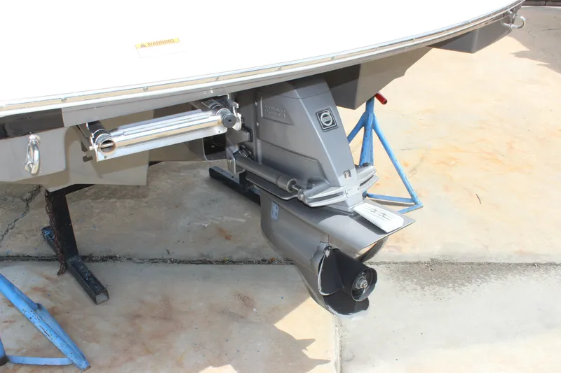 Slide: The Image of 2012 Regal 2100 RS Bowrider boat stern and outdrive on a stand. - 4