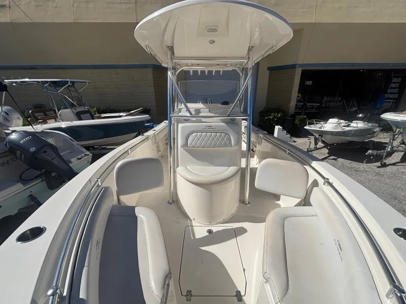 Slide: The Image of 2022 Cobia 237 Center Console boat with spacious seating and sleek design. - 15