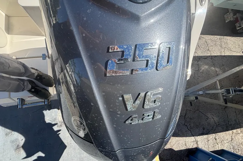 Slide: The Image of Outboard motor on 2022 Cobia 237 Center Console, 250 V6 4.2L engine. - 5