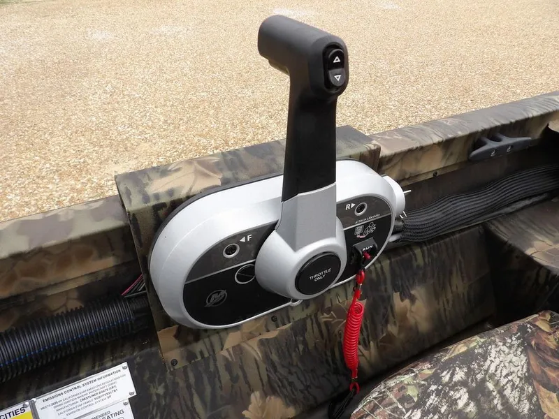 Slide: The Image of Control panel of 2025 Crestliner 2070 Retriever SCHD boat with camouflage design. - 20