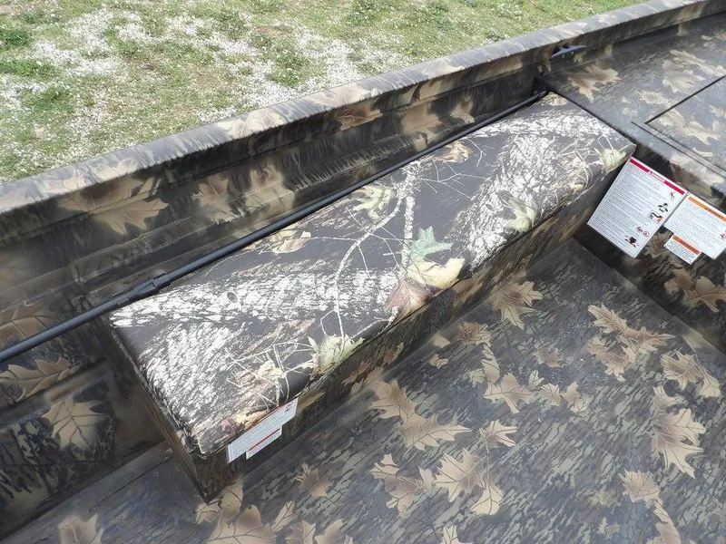 Slide: The Image of Camo interior of 2025 Crestliner 2070 Retriever SCHD boat with bench seating. - 22