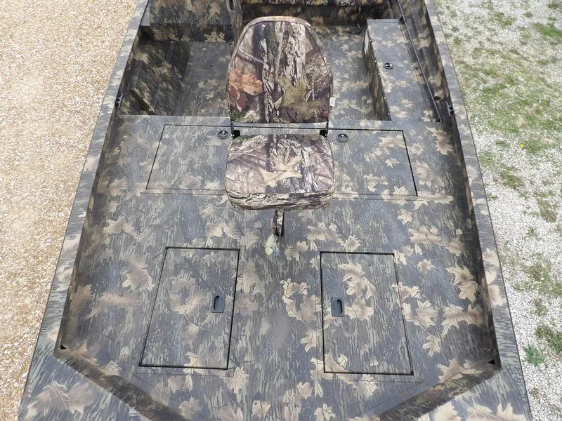 Slide: The Image of 2025 Crestliner 2070 Retriever SCHD boat with camouflage seating and storage compartments. - 31