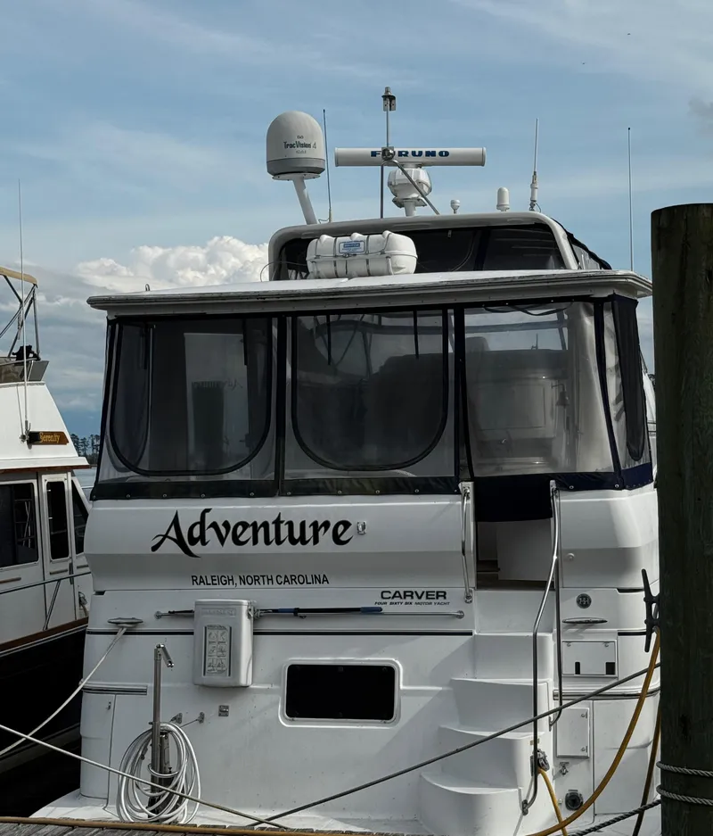 Slide: The Image of 2001 Carver 466 Motor Yacht docked, named "Adventure," in Raleigh, North Carolina. - 7