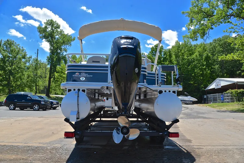 Slide: The Image of 2023 Sun Tracker Fishin Barge 20 DLX pontoon boat at a sunny dock. - 13